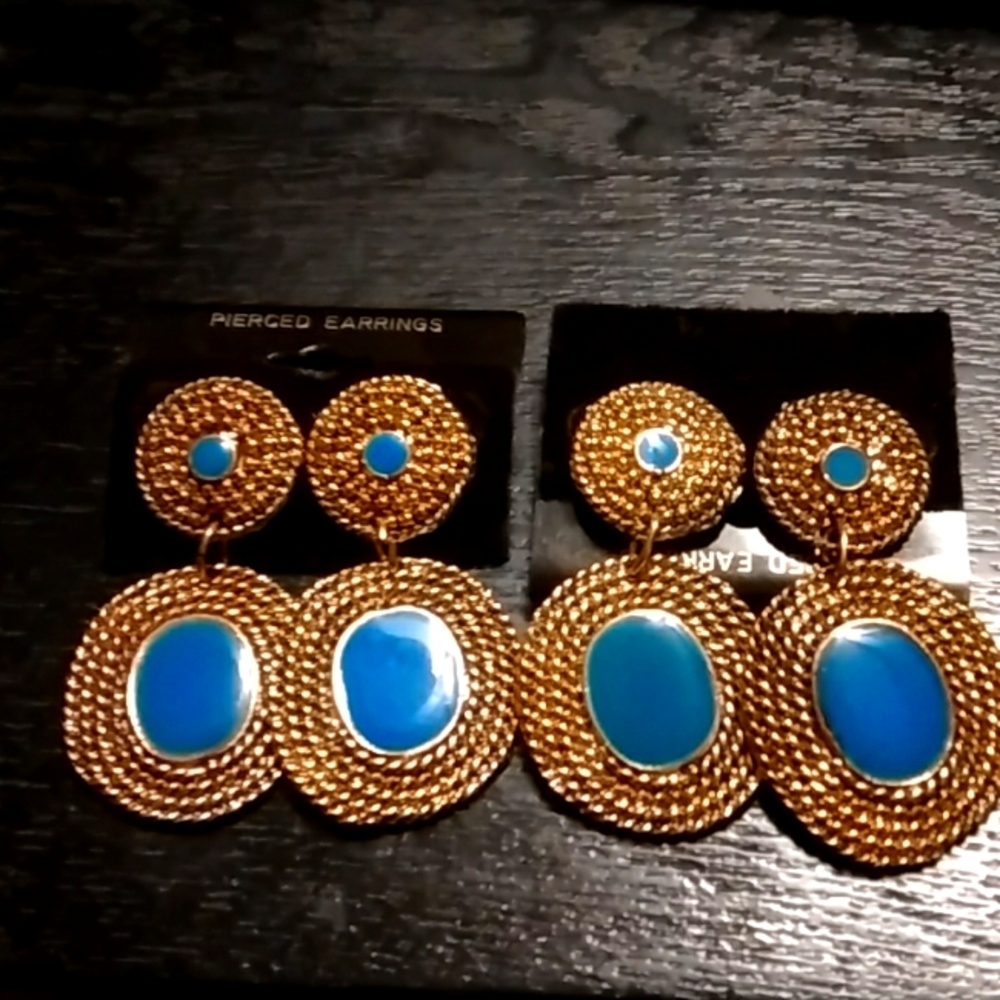 Blue enamel centers around golden rope framed drop earrings